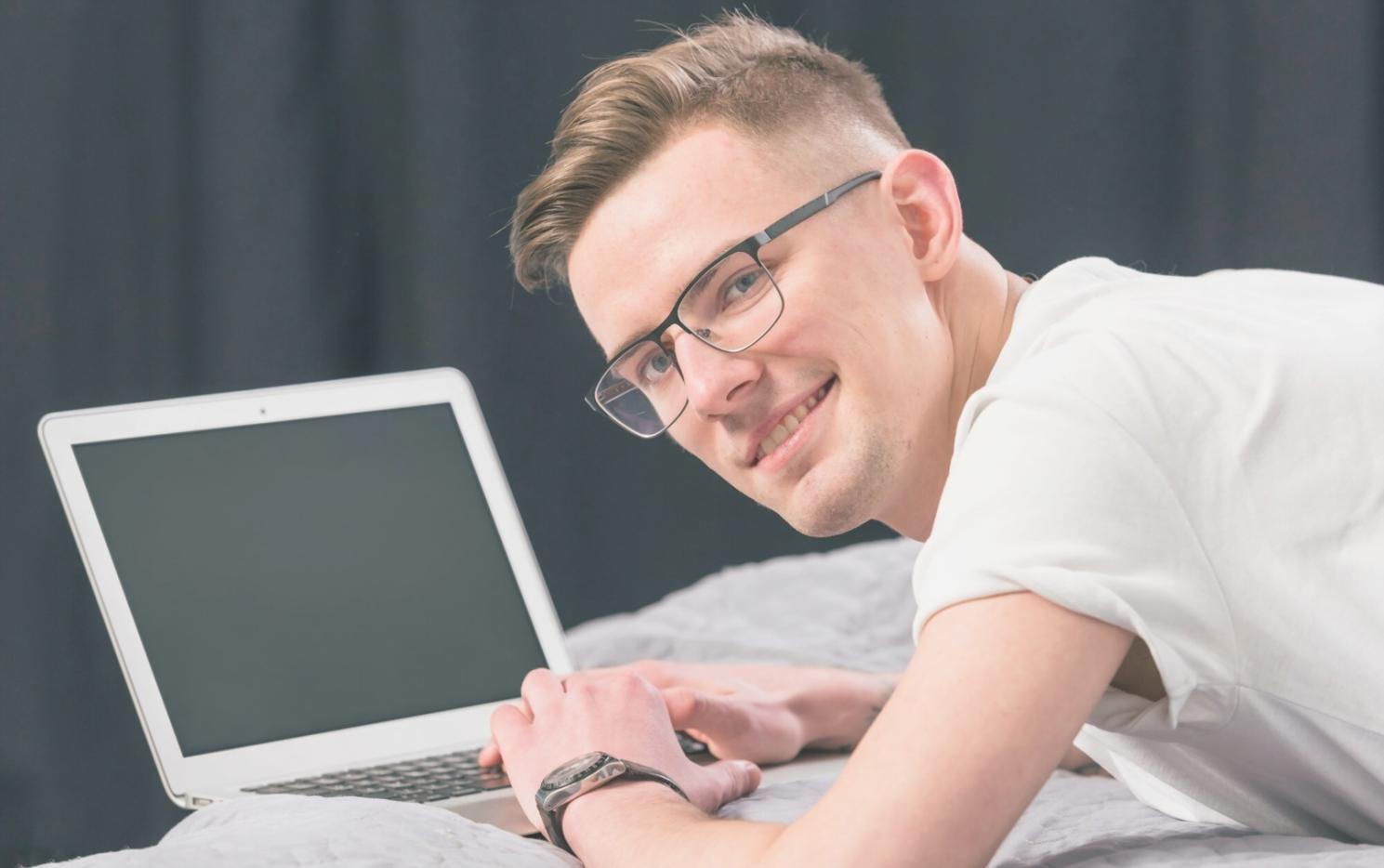 Professional UI design workspace with multiple monitors showing design systems